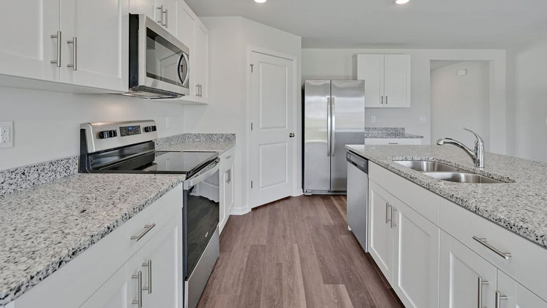 Representative furnished interior of a home built from the HAYDEN by D.R. Horton in Patriot Pointe at Towne Pointe, Jacksonville (Image 8). Representative furnished interior of a home built from the HAYDEN by D.R. Horton in Patriot Pointe at Towne Pointe, Jacksonville (Image 8).