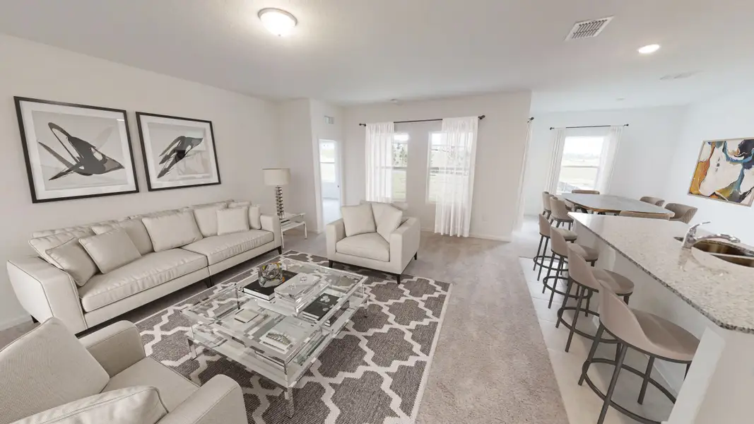 Representative furnished interior of a home built from the Hawking by Starlight Homes in Hawks Run, Kissimmee (Image 6).