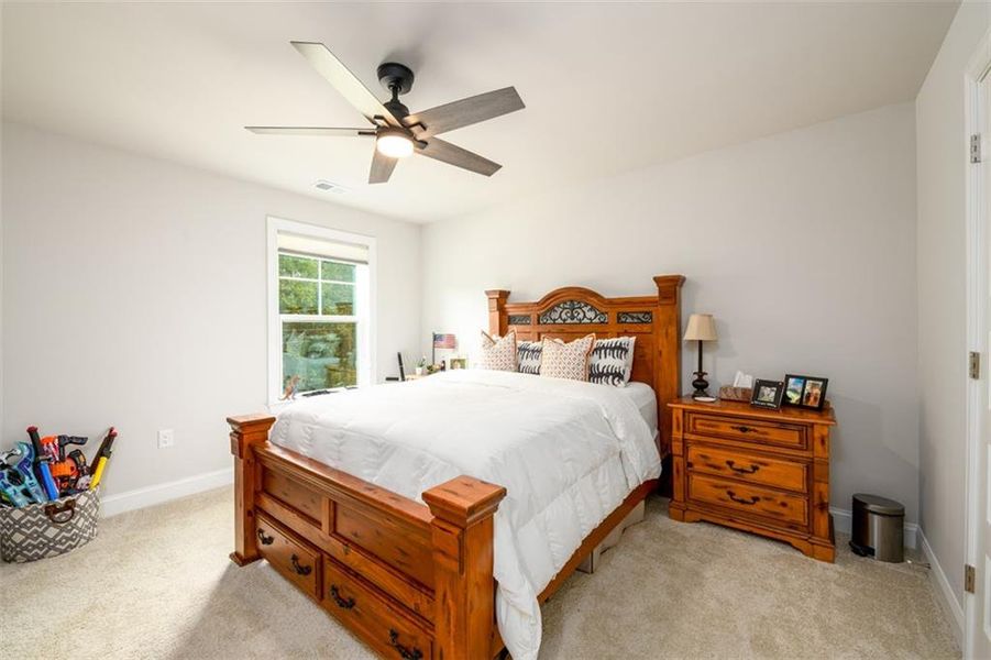Furnished interior view inside a new home in Holiday Pines, Buford (Image 28).