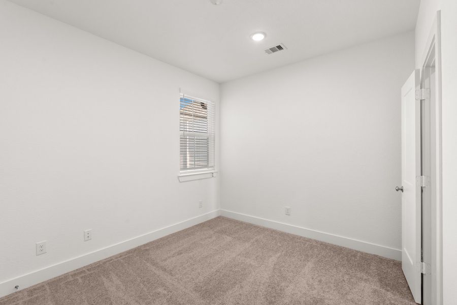 Spacious, unfurnished interior of a new home in Meridiana, Manvel (Image 32).