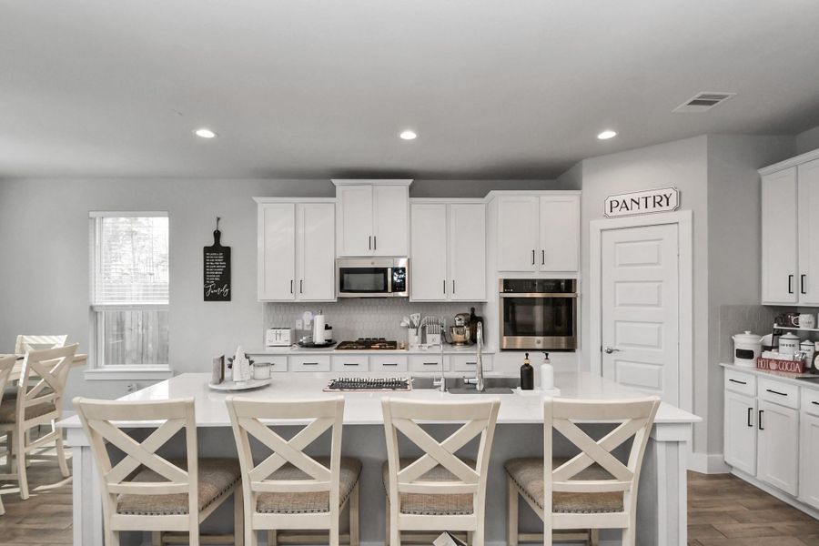 Furnished interior view inside a new home in , Conroe (Image 8).