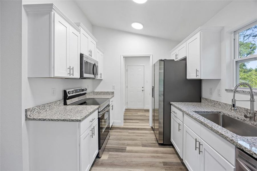 Furnished interior view inside a new home in , Summerfield (Image 6).