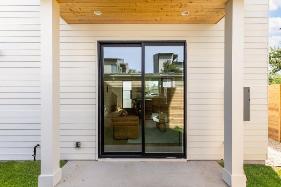 Entrance to property with a patio