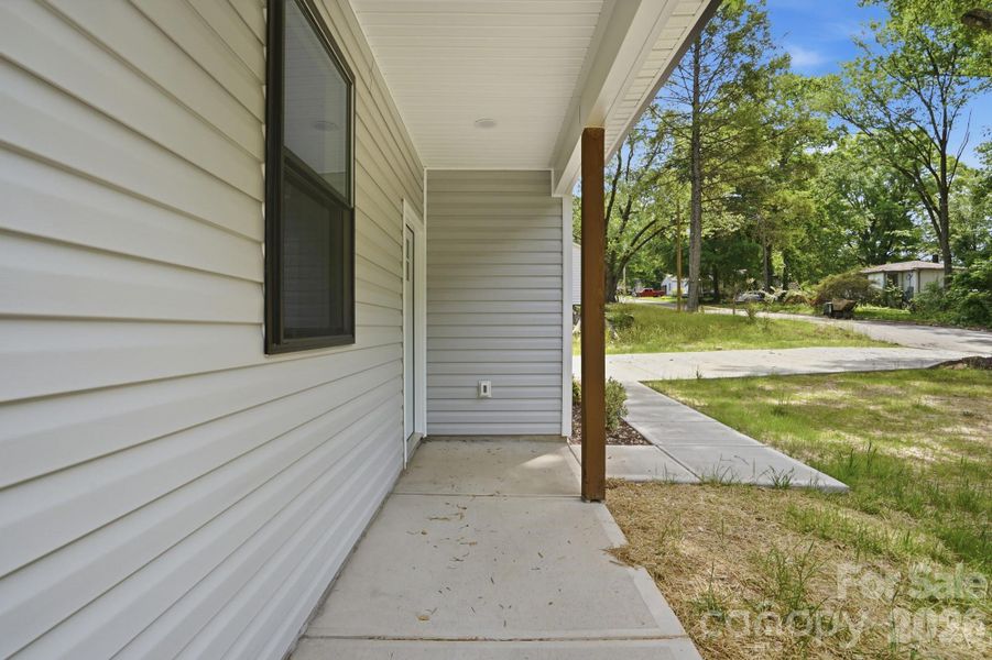 Exterior details and patio area of a home in , Statesville (Image 29).