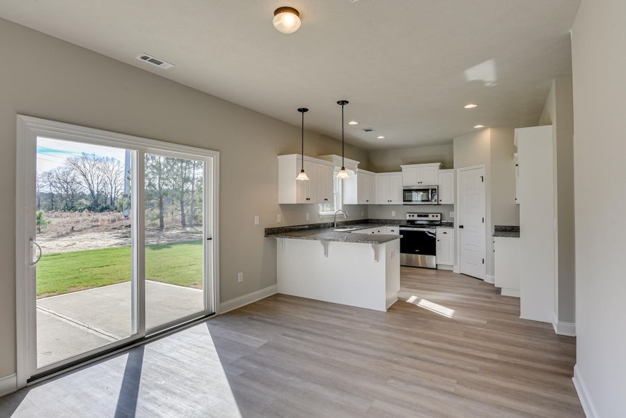 Furnished interior view inside a new home in , Edgefield (Image 8).