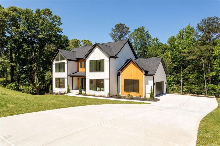 Front exterior of a new home in , Powder Springs, GA, highlighting curb appeal (Image 30).
