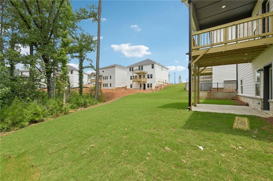 Exterior details and patio area of a home in Martin Springs - Estate Series, Lawrenceville (Image 29).