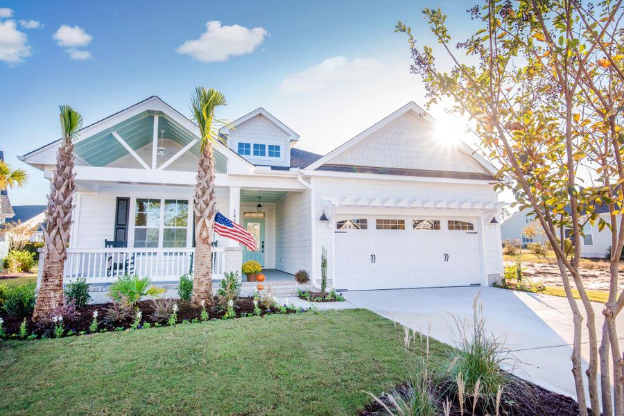 Representative exterior photo of a completed home built from the Kauai by Bill Clark Homes in Osprey Landing, Southport, NC (Image 26). Representative exterior photo of a completed home built from the Kauai by Bill Clark Homes in Osprey Landing, Southport, NC (Image 26).