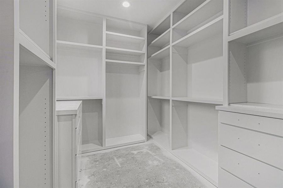 Oversized Primary Walk-in closet with custom builtins.Construction as of 12/18/24