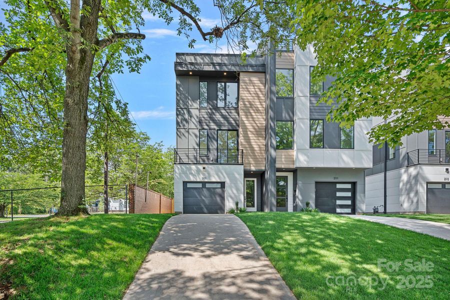 Front exterior of a new home in , Charlotte, NC, highlighting curb appeal (Image 24).