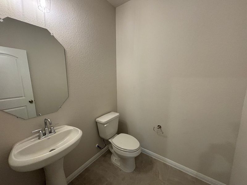Furnished interior view inside a new home in Cannon Ranch 40s, Dripping Springs (Image 9).