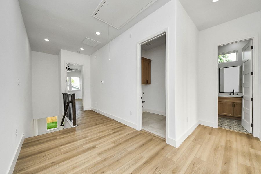 Versatile second-floor flex space—perfect for a home office, study, or creative workspace.