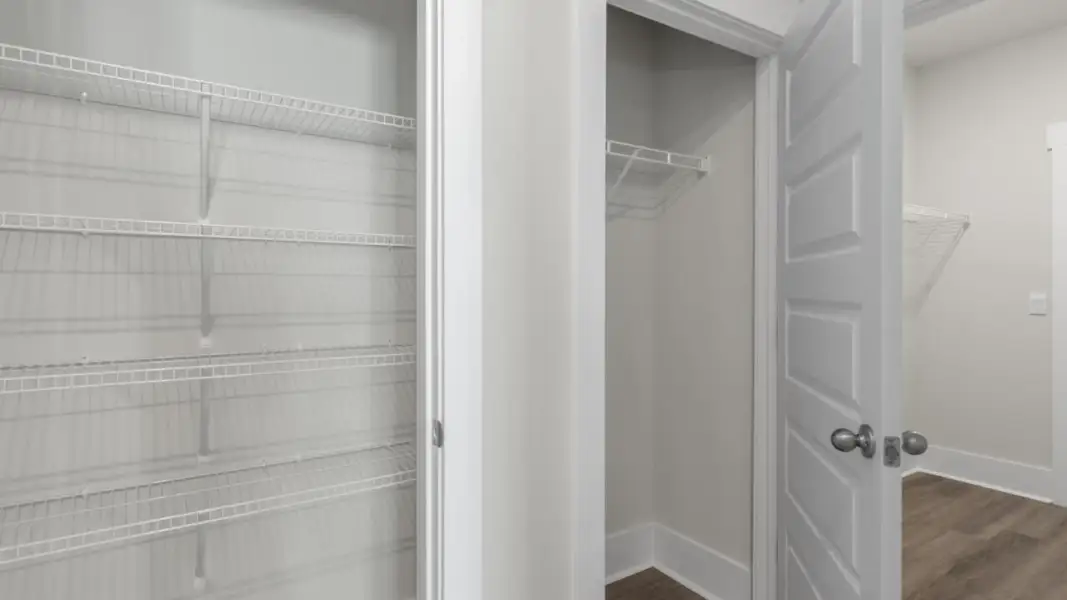 Spacious, unfurnished interior of a new home in The Retreat at Indigo Preserve Townhomes, Leland (Image 26).