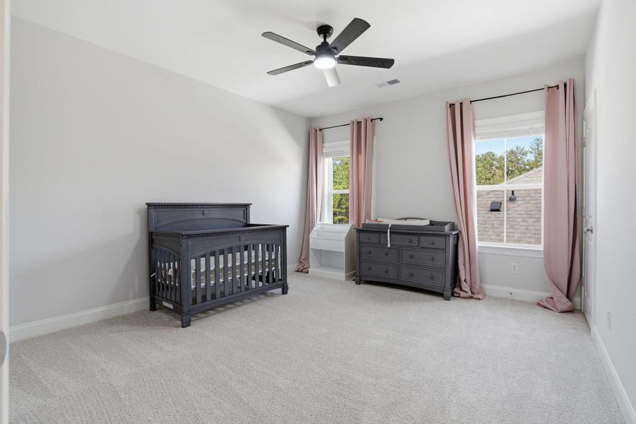 Furnished interior view inside a new home in Tidewater at Lakes of Cane Bay, Summerville (Image 6).