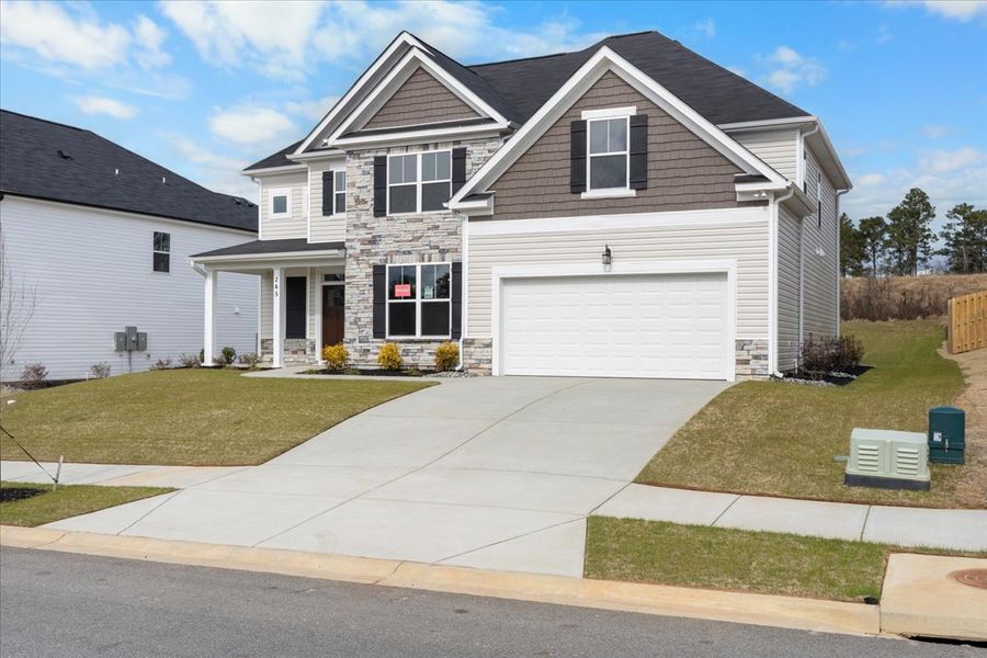 Front exterior of a new home in Windsor, North Augusta, SC, highlighting curb appeal (Image 18).