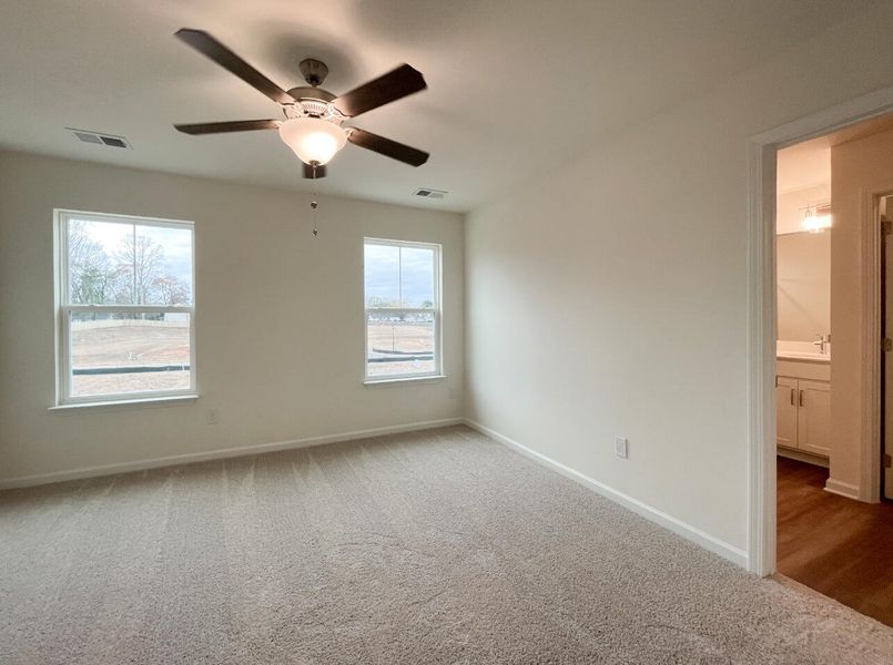Spacious, unfurnished interior of a new home in Bellevue Townhomes, Greenville (Image 21).