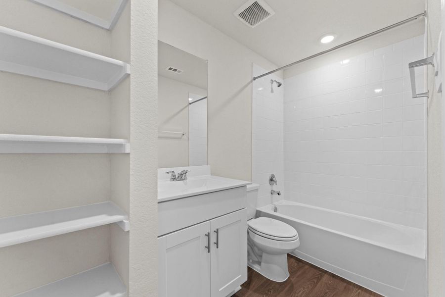 Furnished interior view inside a new home in Whisper South, San Marcos (Image 11).