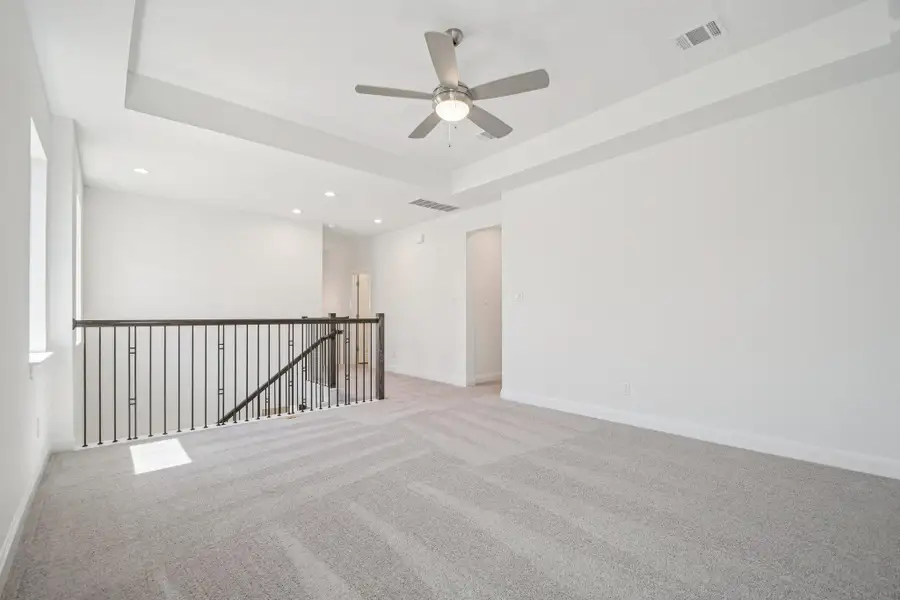 Spacious, unfurnished interior of a new home in 6 Creeks, Kyle (Image 34).