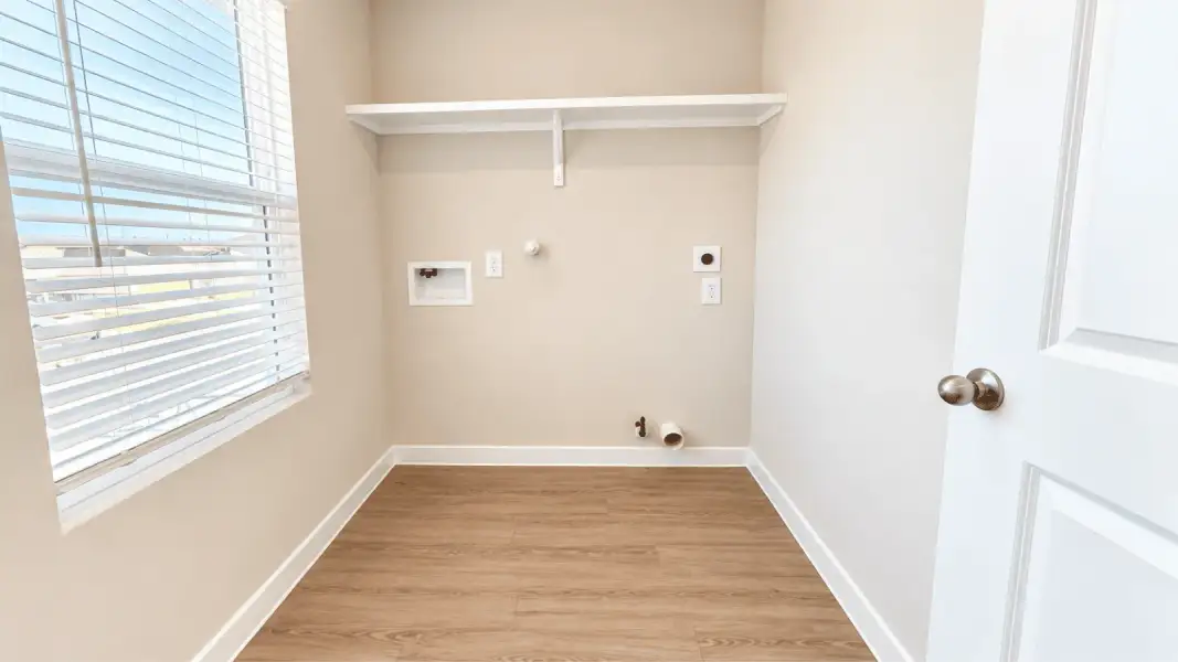 Representative unfurnished interior of a home built from the Davis by D.R. Horton in Flagstop Crossing, Odem (Image 15).