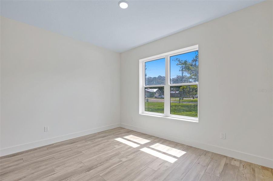 Spacious, unfurnished interior of a new home in , New Smyrna Beach (Image 22).