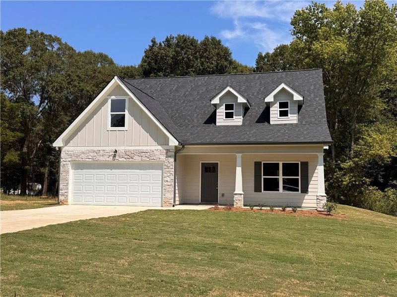 Front exterior of a new home in , Calhoun, GA, highlighting curb appeal (Image 17).