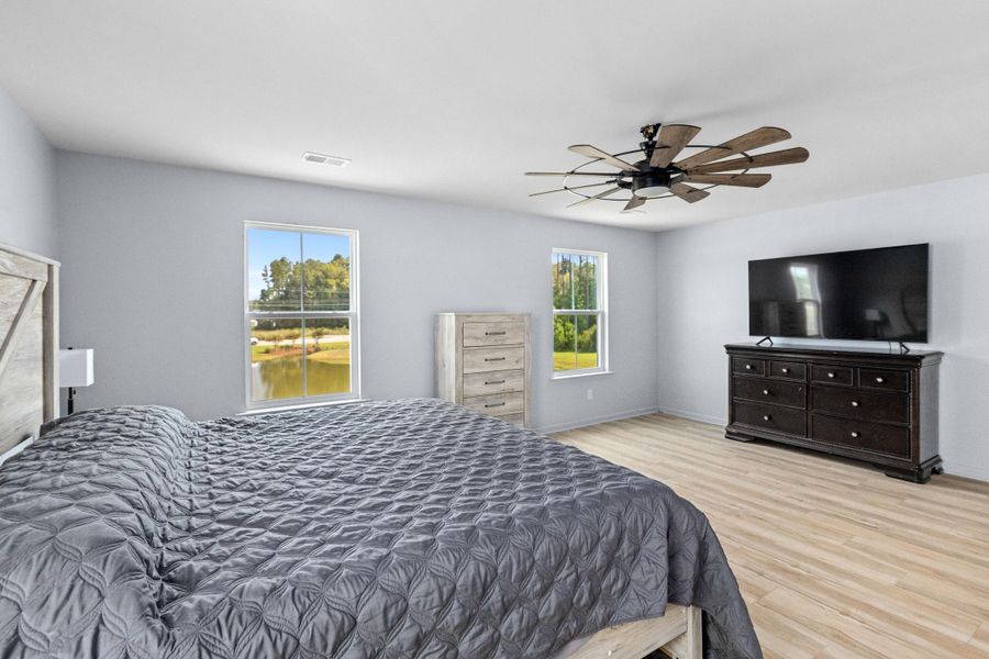 Furnished interior view inside a new home in Sweetgrass at Summers Corner, Summerville (Image 9).