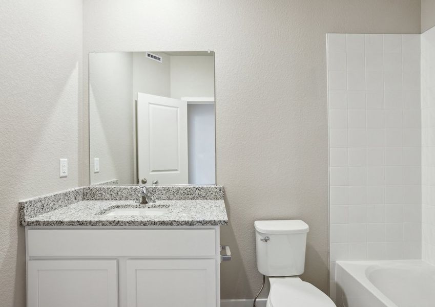 The secondary bathroom has a tub/shower combo.