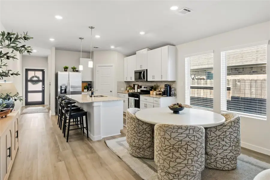 Furnished interior view inside a new home in Heights of Barbers Hill, Mont Belvieu (Image 10).