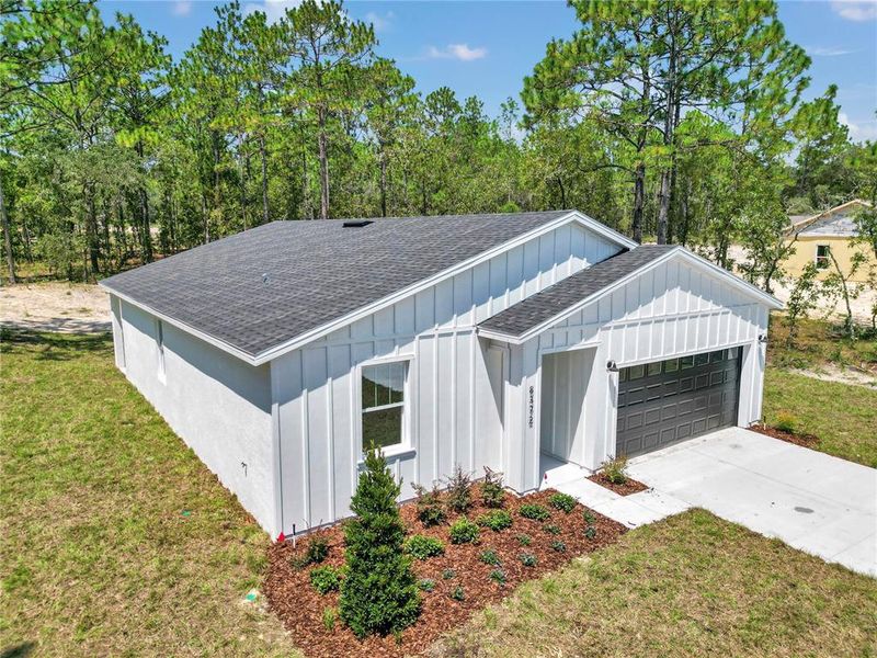 Front exterior of a new home in , Dunnellon, FL, highlighting curb appeal (Image 22). Front exterior of a new home in , Dunnellon, FL, highlighting curb appeal (Image 22).