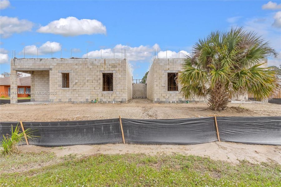 Front exterior of a new home in , Palm Bay, FL, highlighting curb appeal (Image 15).
