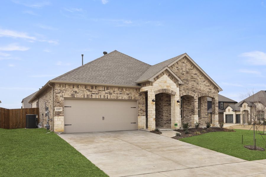 Representative exterior photo of a completed home built from the Brookstone I by Sandlin Homes in Timberbrook, Justin, TX (Image 20).