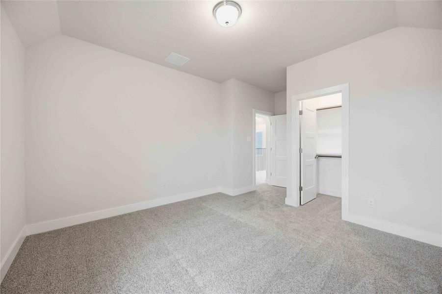 Spacious, unfurnished interior of a new home in Ellwood, Iowa Colony (Image 31).