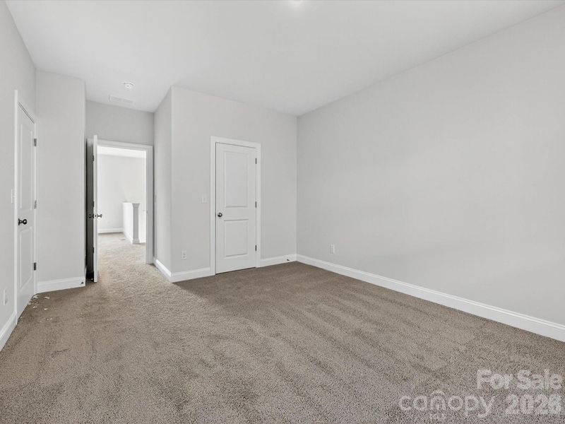 Spacious, unfurnished interior of a new home in North Creek Village, Huntersville (Image 38).