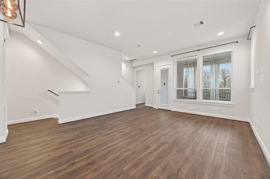 Spacious, unfurnished interior of a new home in The Corner At Buffalo Pointe, Houston (Image 27).