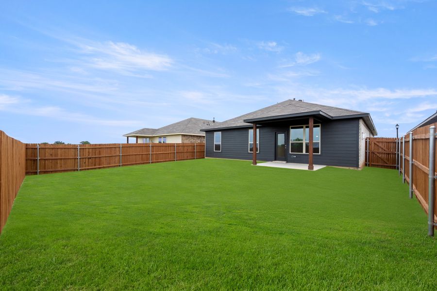 Exterior details and patio area of a home in Baker Farms, Cleburne (Image 20).
