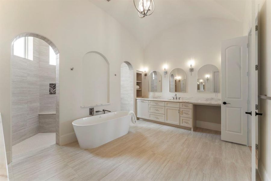 Another view with a peak of the stately shower. Notice the arched ceiling work which is even more stunning in person.