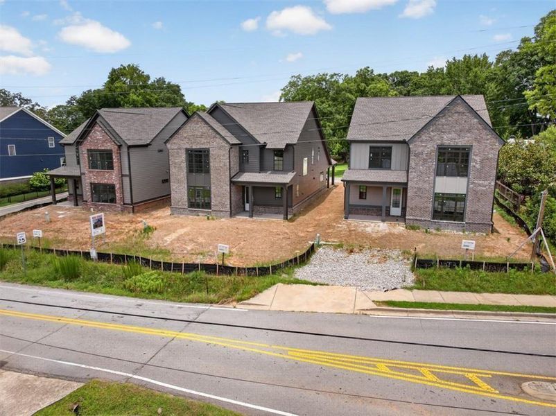 Front exterior of a new home in , Flowery Branch, GA, highlighting curb appeal (Image 35). Front exterior of a new home in , Flowery Branch, GA, highlighting curb appeal (Image 35).