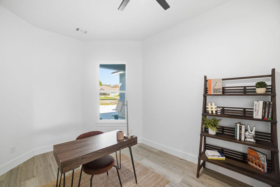 Office area featuring light wood finished floors and ceiling fan Office area featuring light wood finished floors and ceiling fan