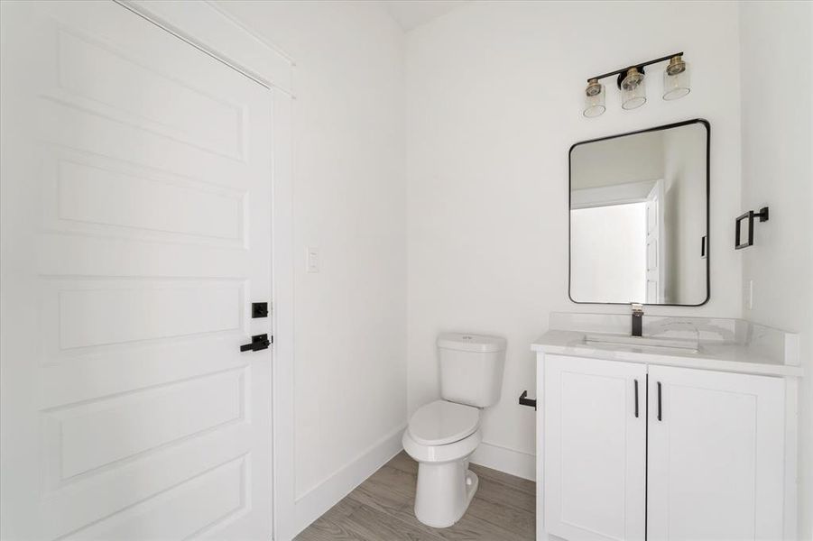 Spacious half bath for the convenience of your guests.