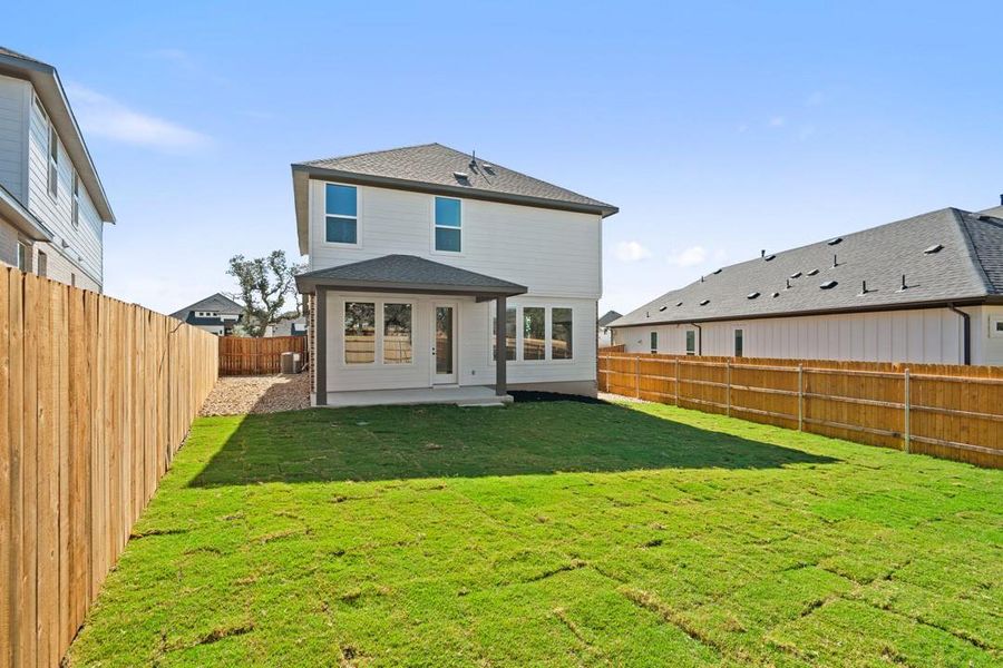 Exterior details and patio area of a home in Terrace Collection at Heritage, Dripping Springs (Image 4). Exterior details and patio area of a home in Terrace Collection at Heritage, Dripping Springs (Image 4).
