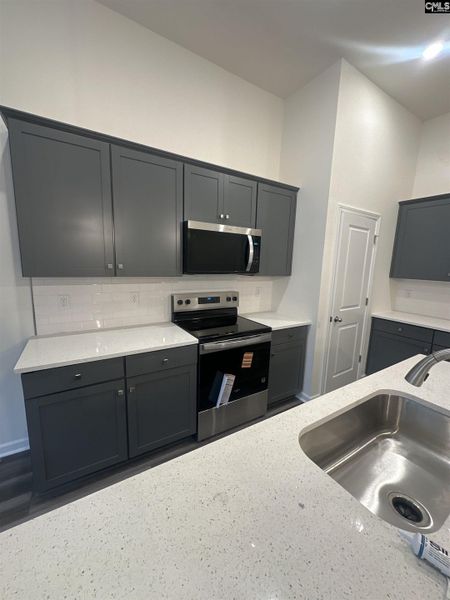 Furnished interior view inside a new home in Piney Woods Bluff, Columbia (Image 4). Furnished interior view inside a new home in Piney Woods Bluff, Columbia (Image 4).