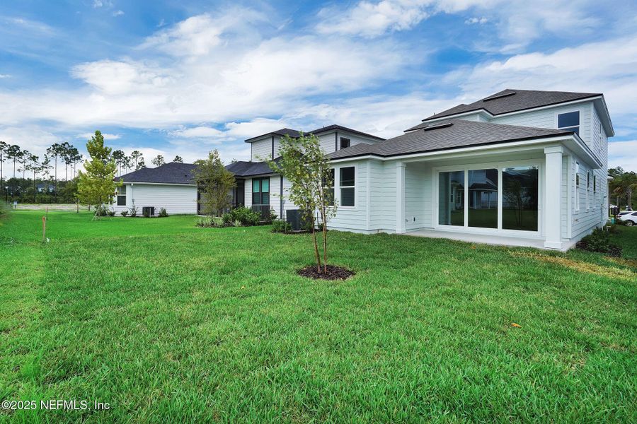 Exterior details and patio area of a home in Crosswinds at Nocatee, Ponte Vedra (Image 22).