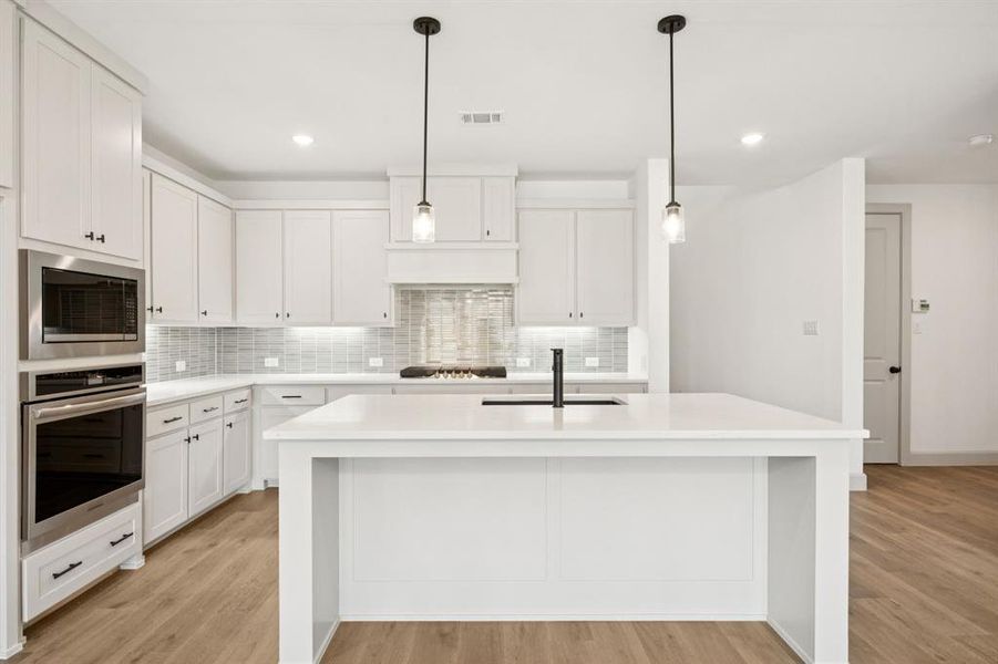 This chef's dream kitchen is the hub of your new dream home! This chef's dream kitchen is the hub of your new dream home!