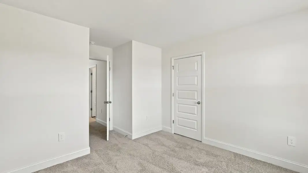 Spacious, unfurnished interior of a new home in The Lakes at North Glynn, Brunswick (Image 15).