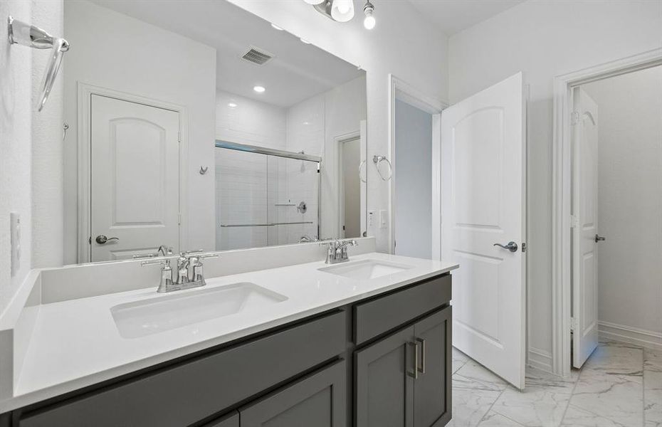 Primary bathroom with double vanity Primary bathroom with double vanity