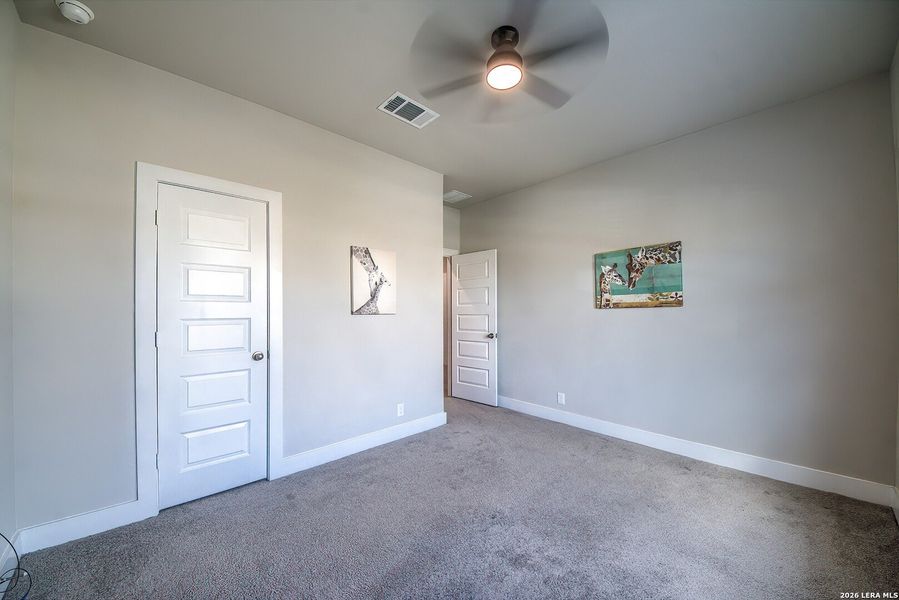 Spacious, unfurnished interior of a new home in Brookstone Creek, San Antonio (Image 19).