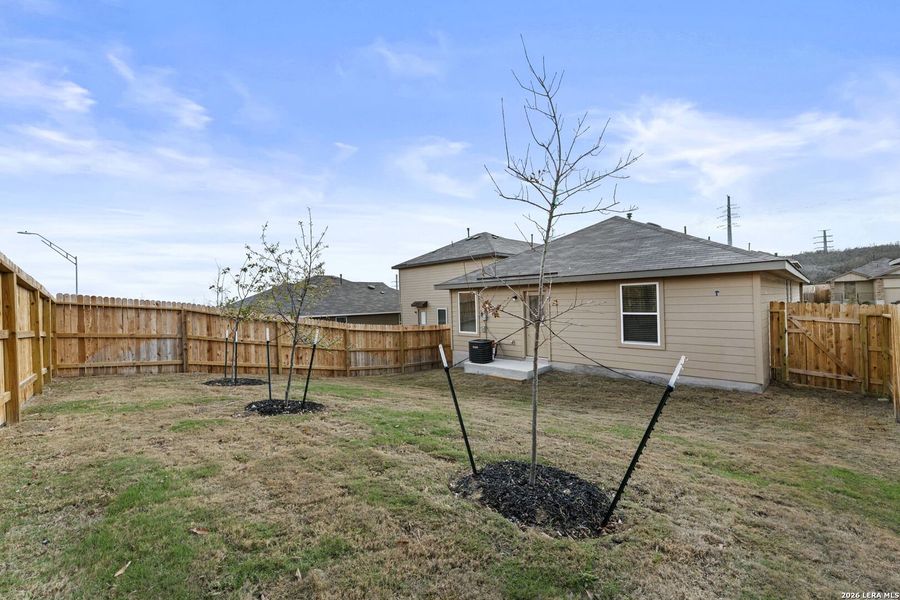 Exterior details and patio area of a home in Applewood, San Antonio (Image 2).