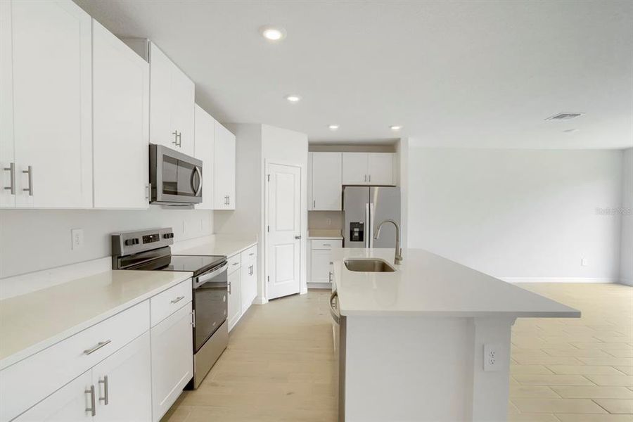 Furnished interior view inside a new home in Salt Meadows - Classic Series, Parrish (Image 8).