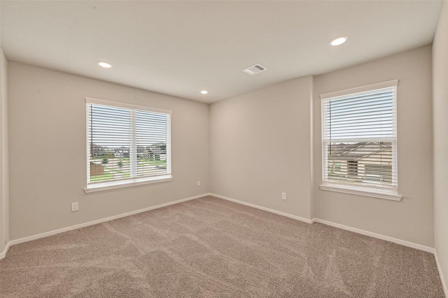 Spacious, unfurnished interior of a new home in Sunterra, Katy (Image 28).