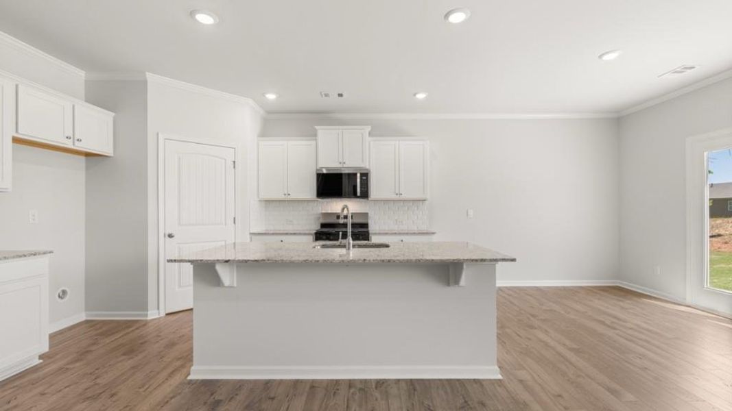 Furnished interior view inside a new home in Parkside at Carter Grove, Cartersville (Image 5).